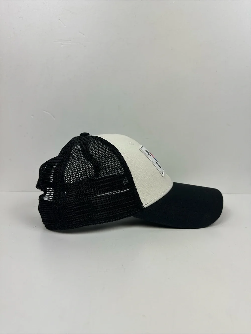 The North Face Black & White Trucker Hat with South Korea Flag Patch